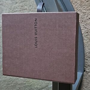 Louis Vittton box and dust bag from a man's wallet